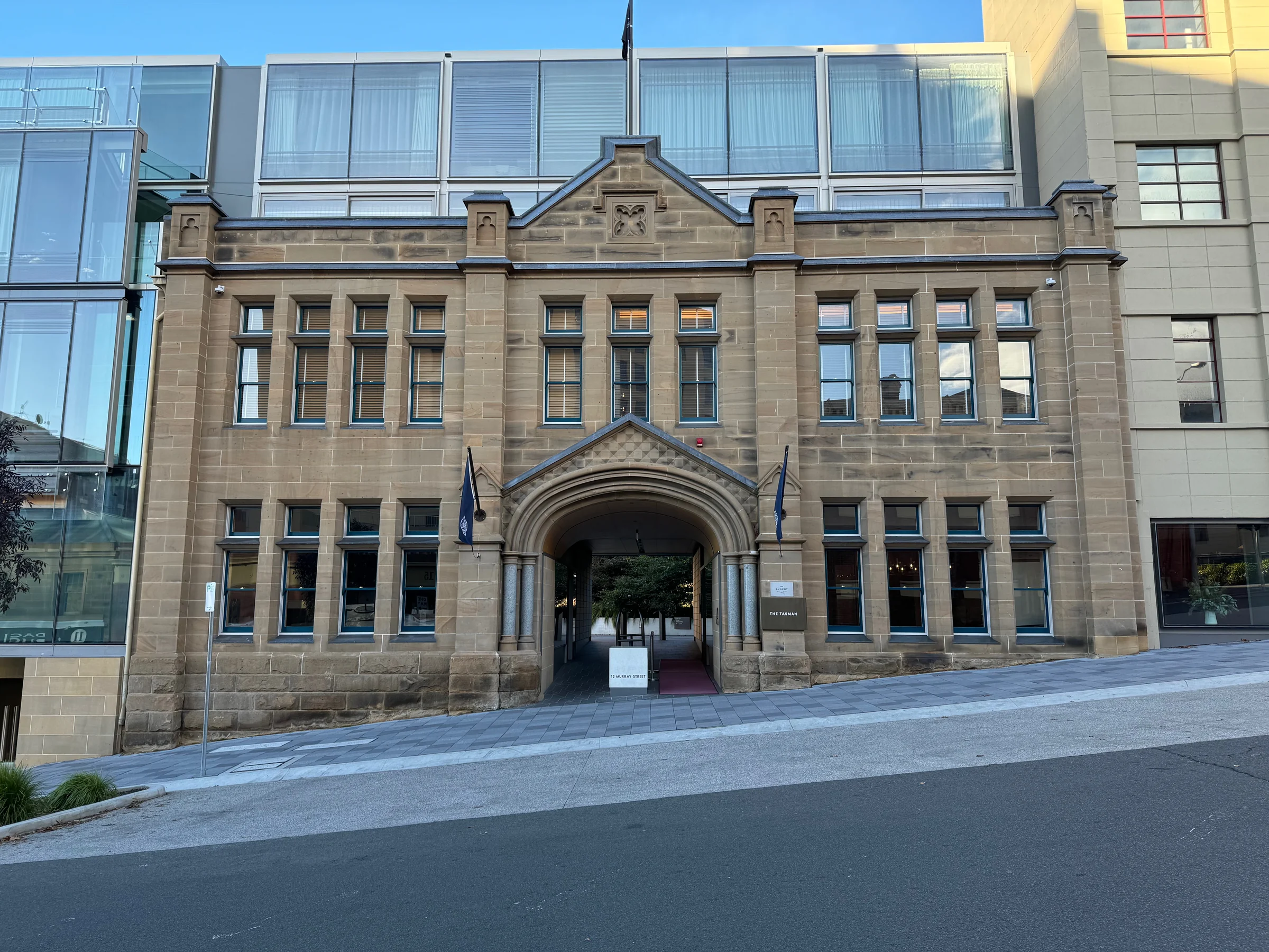 The stone main entrance, and the building beyond.