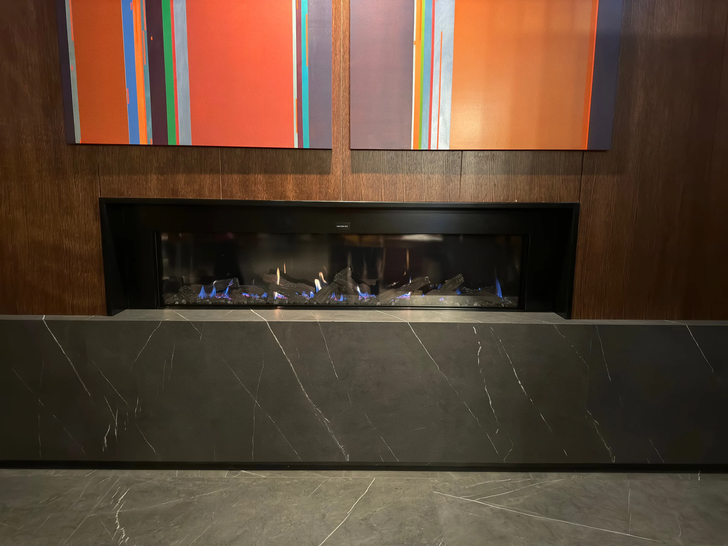 Flames in the hotel fireplace.