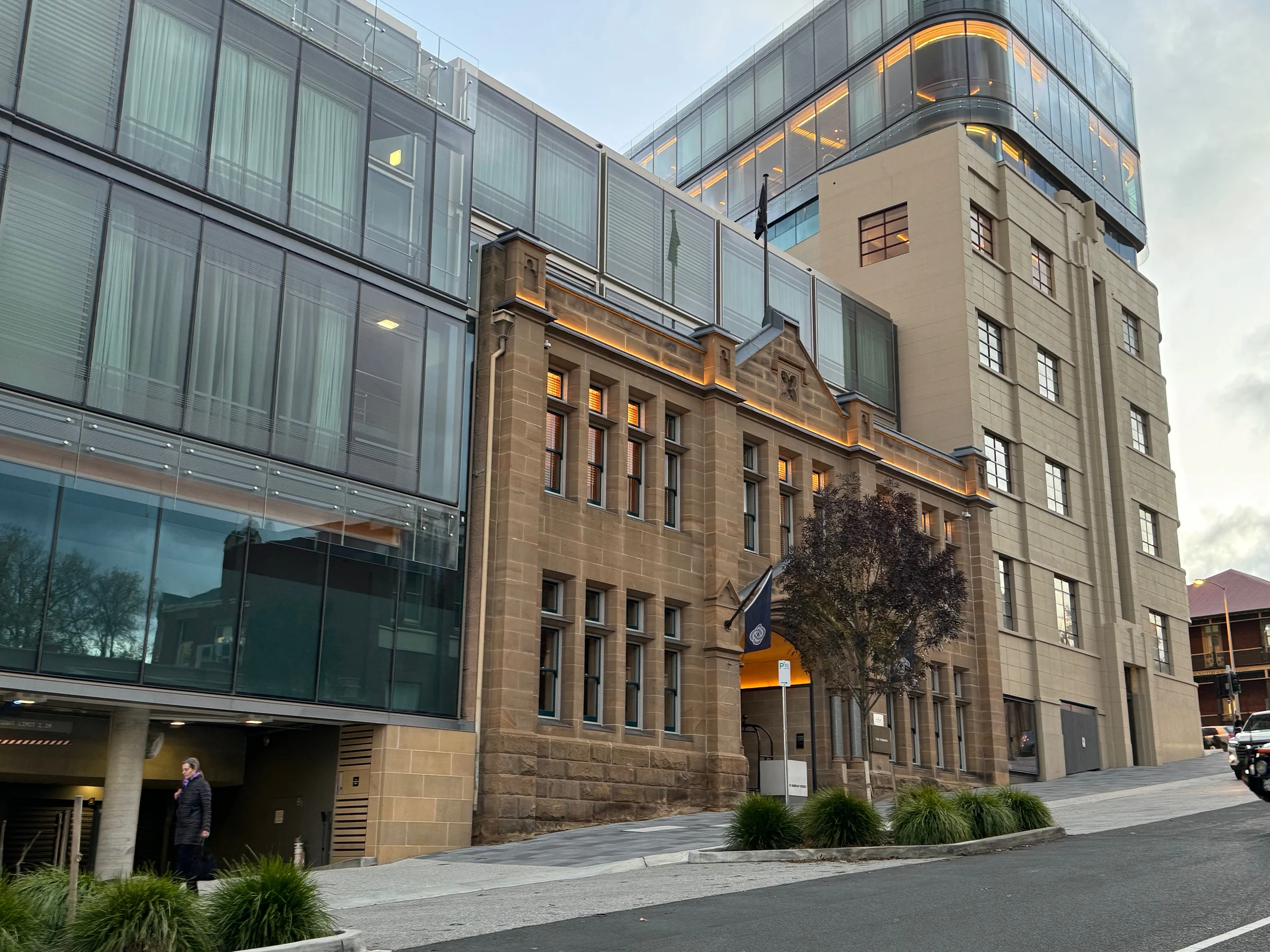 The historic building beside the modern wing.