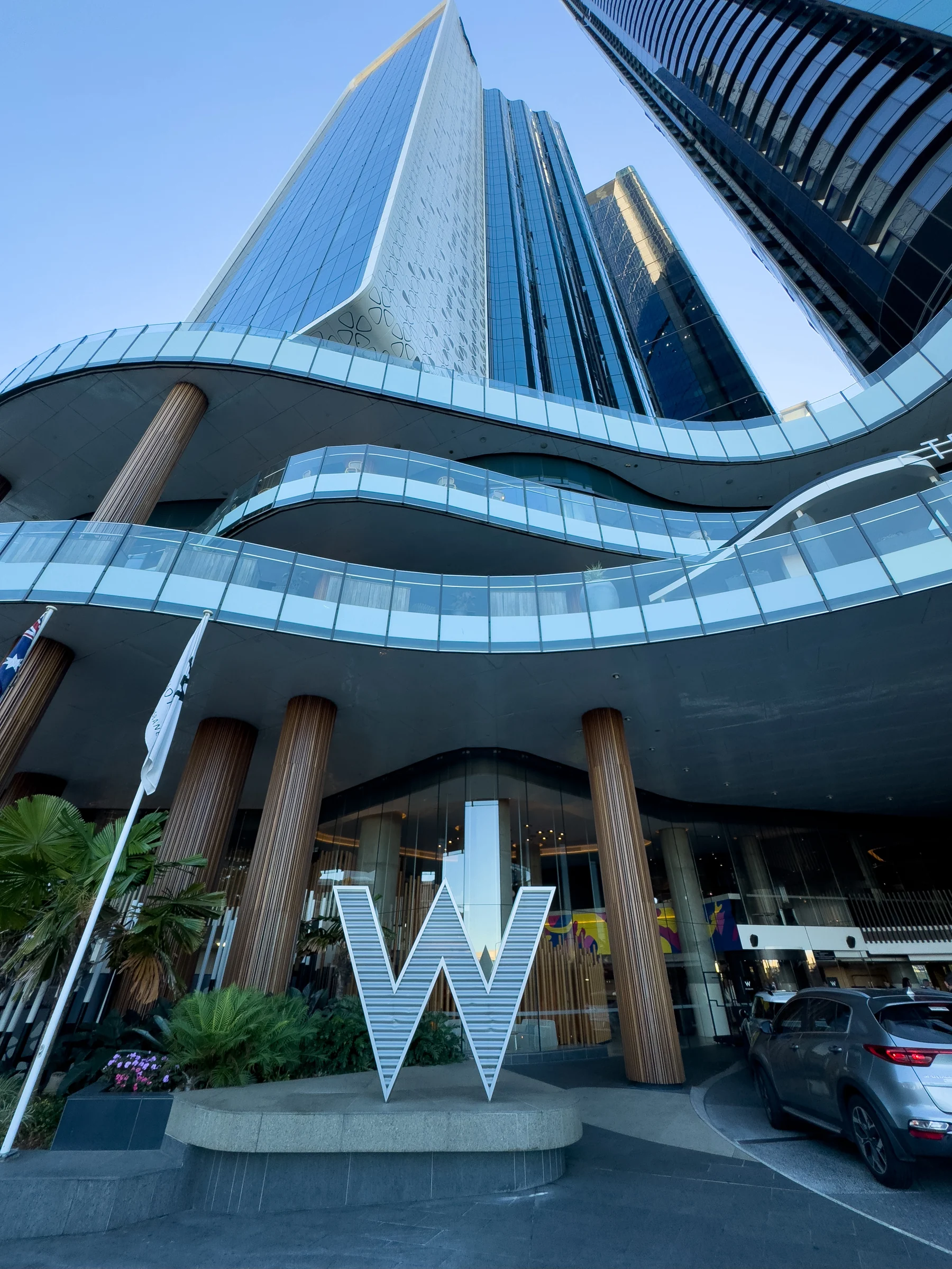 Looking up at the hotel’s layered curves.