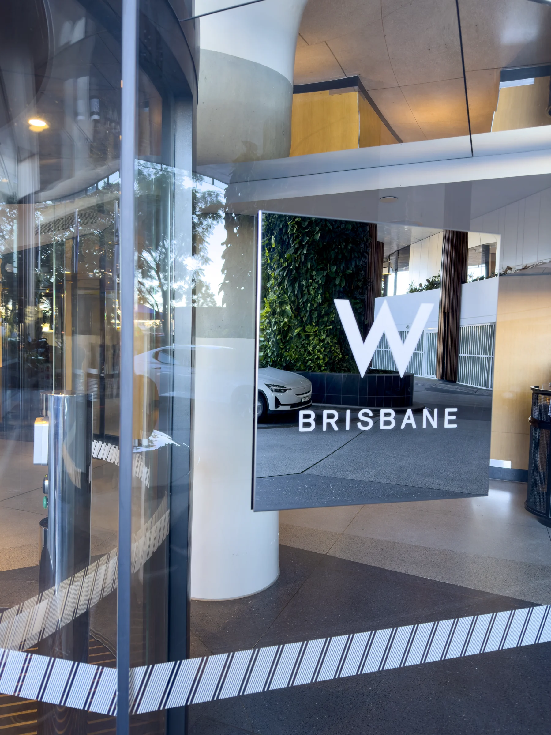 The W Brisbane sign at the entrance.