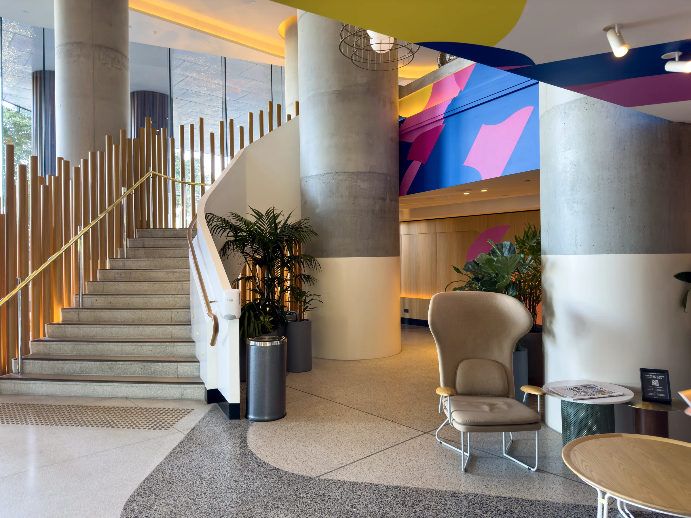 The colorful lobby and stairs leading upstairs.