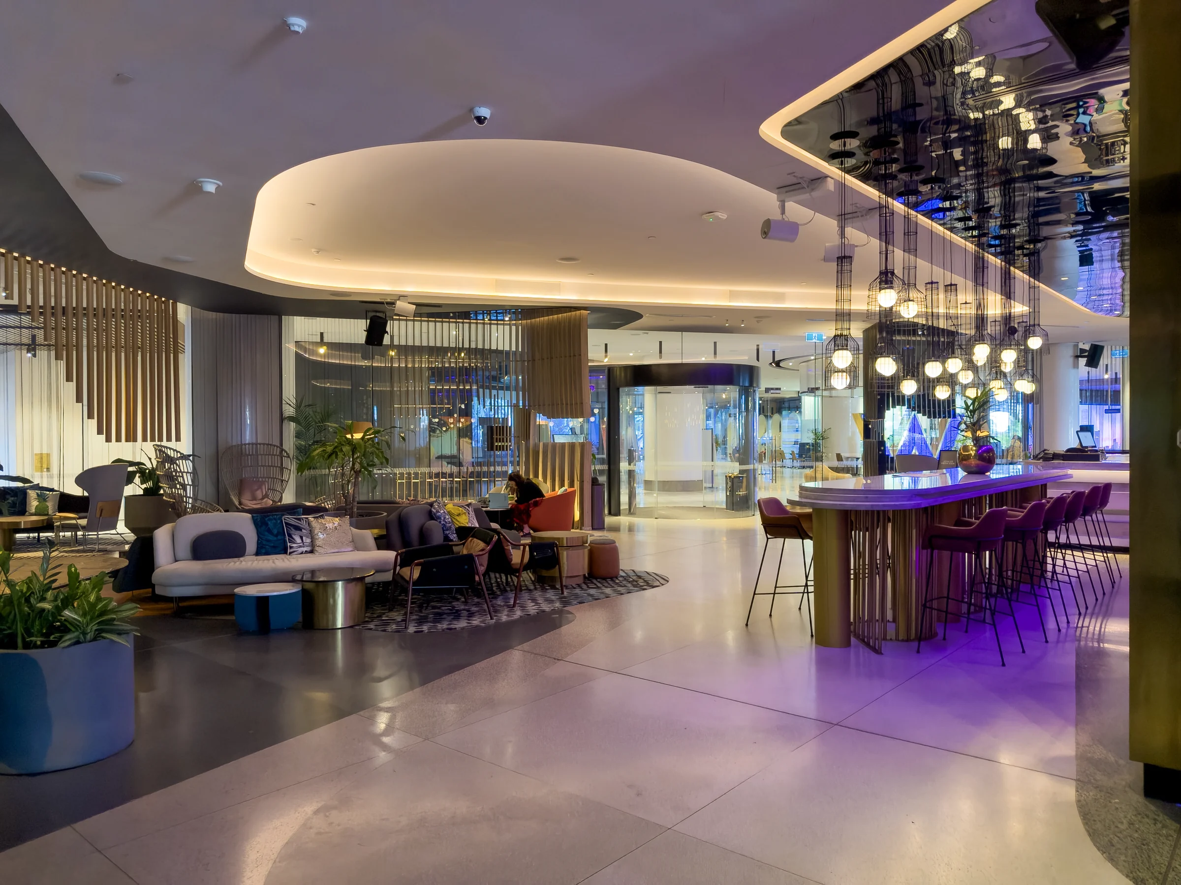 The curved ceiling and Living Room Bar.