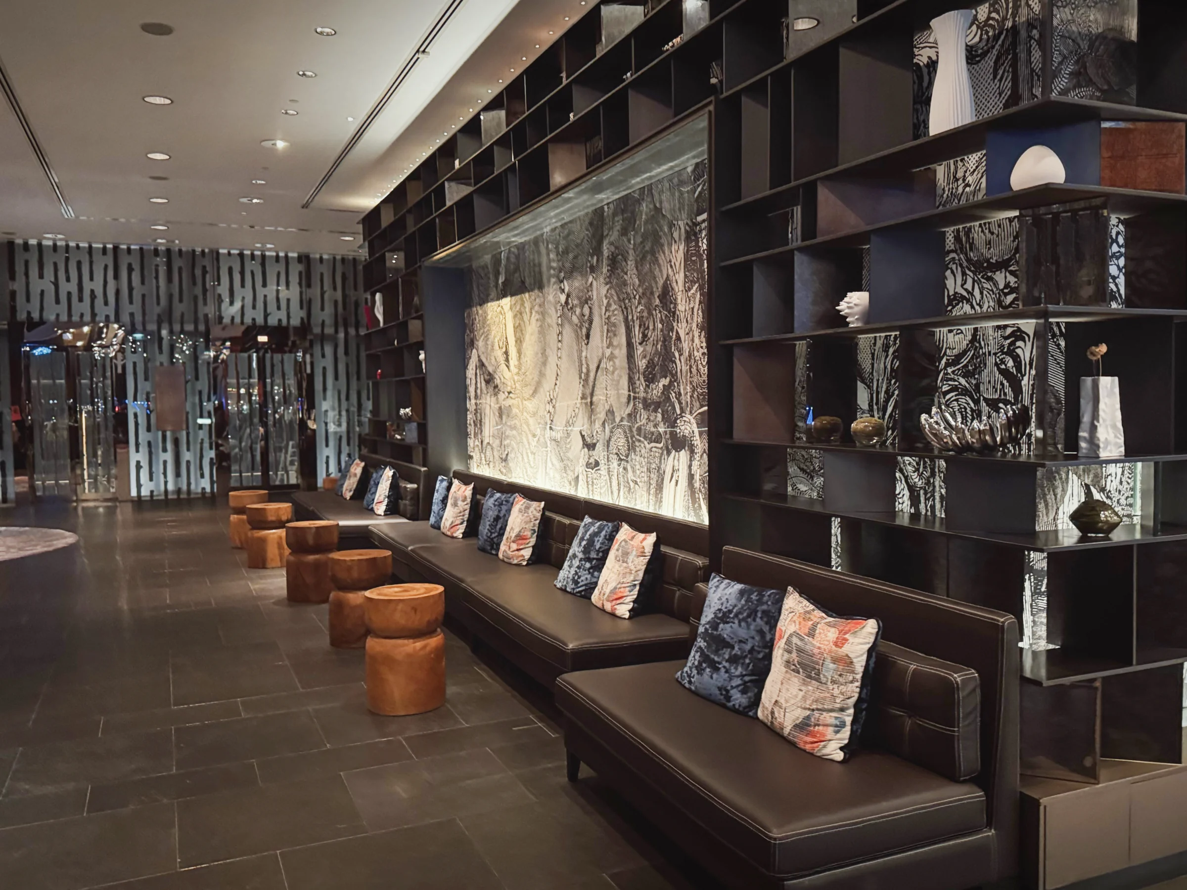 The lobby with bookshelves and sofas.