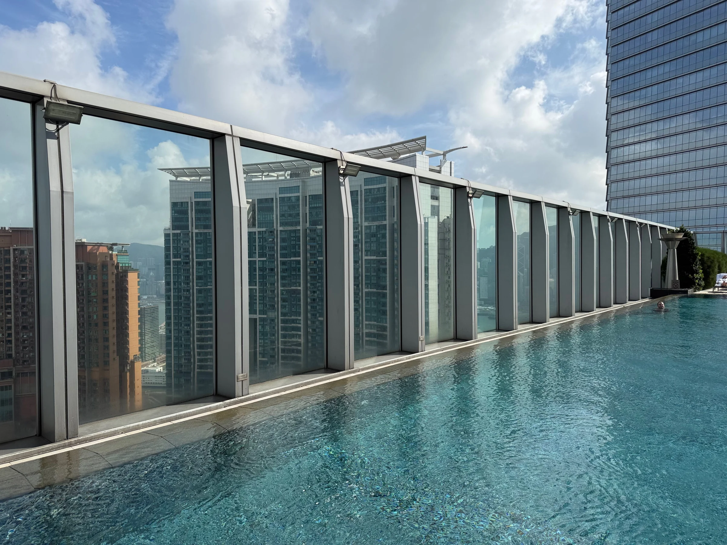 W Hong Kong's rooftop pool on the 76th floor and Hong Kong skyscrapers