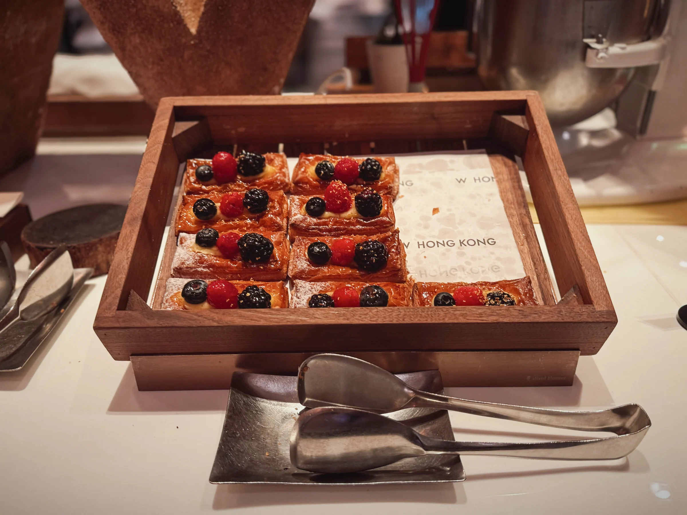 A Danish pastry topped with berries.
