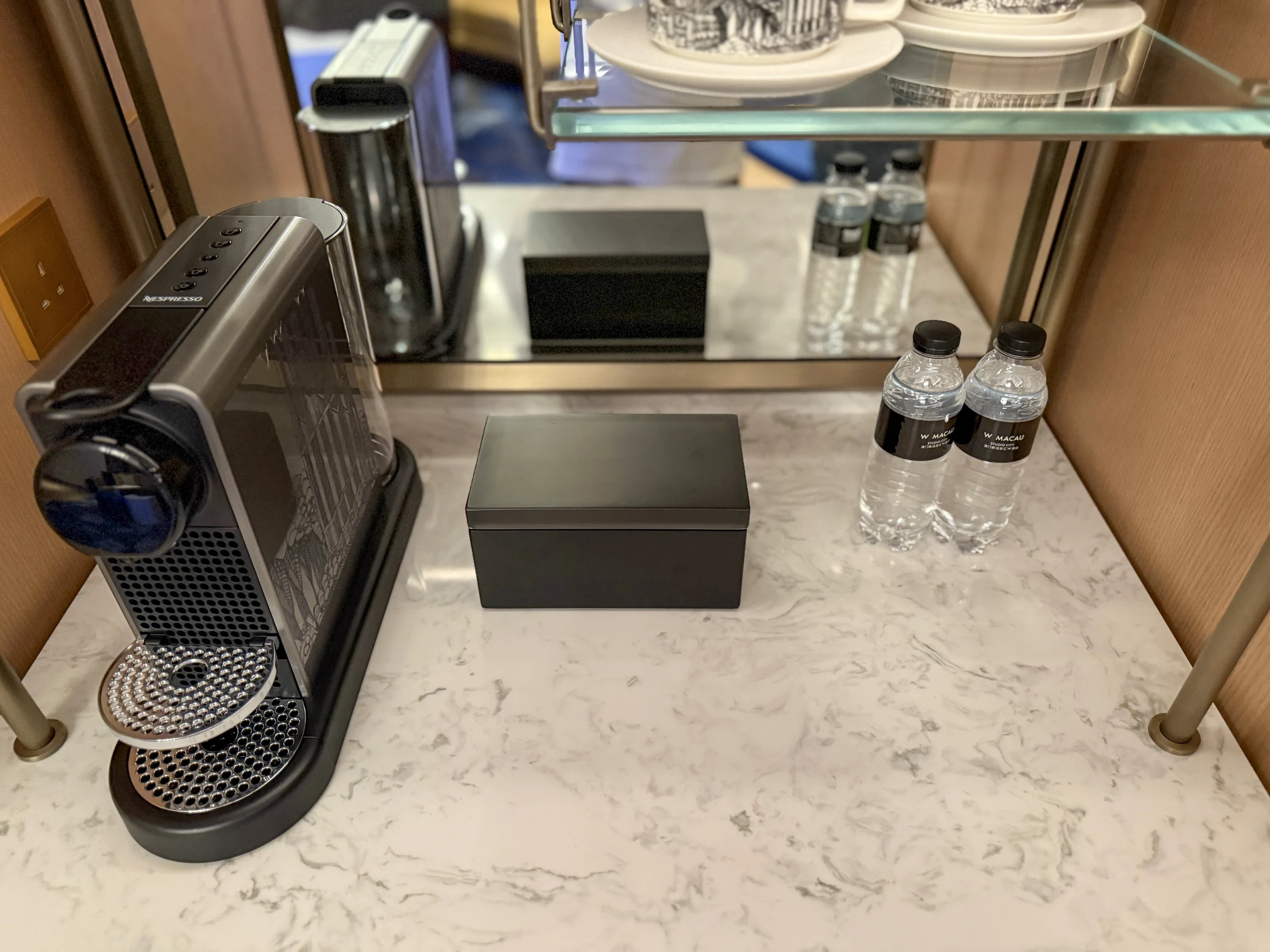 The coffee machine and bottled water