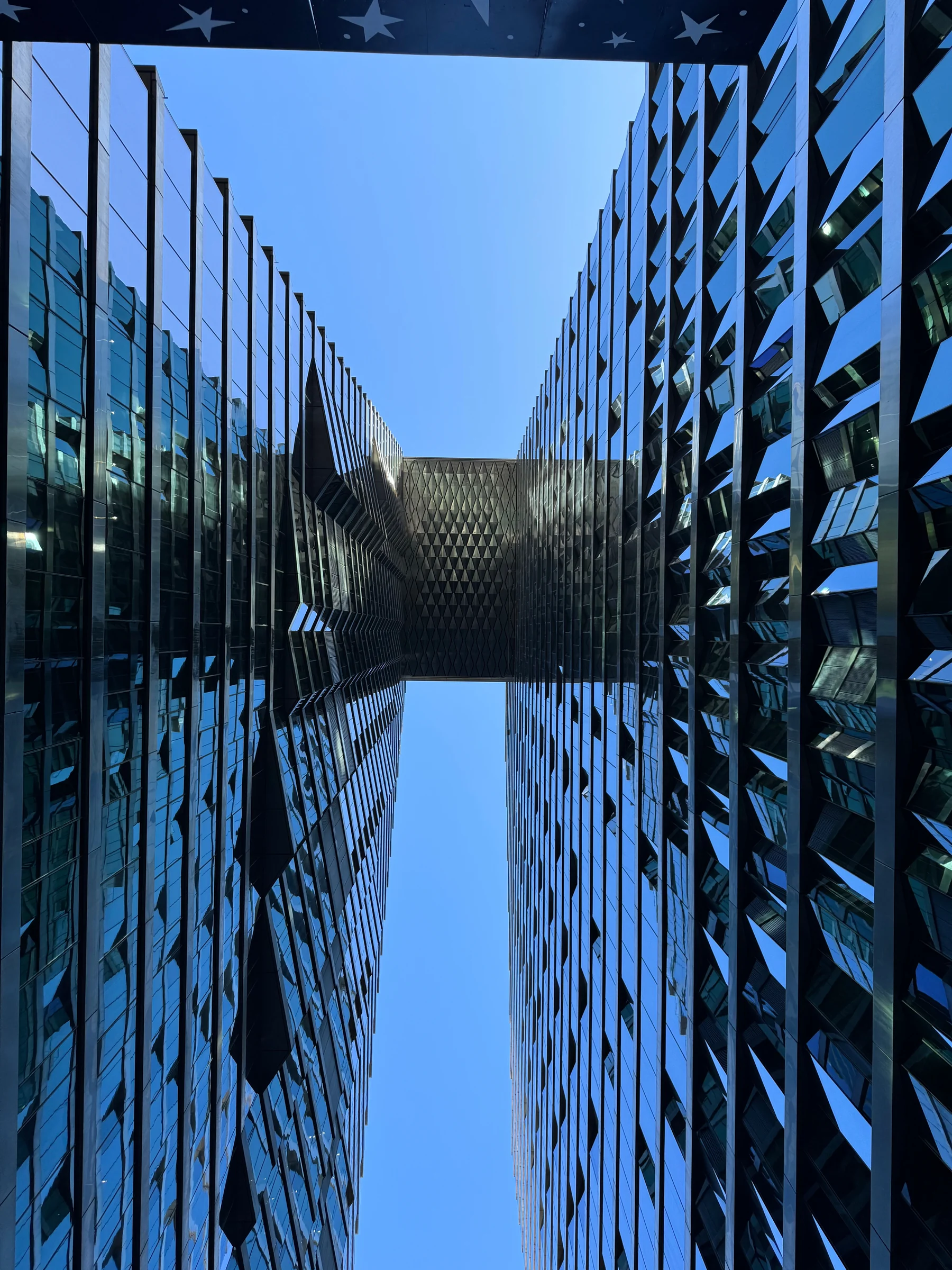 Blue sky between the buildings.