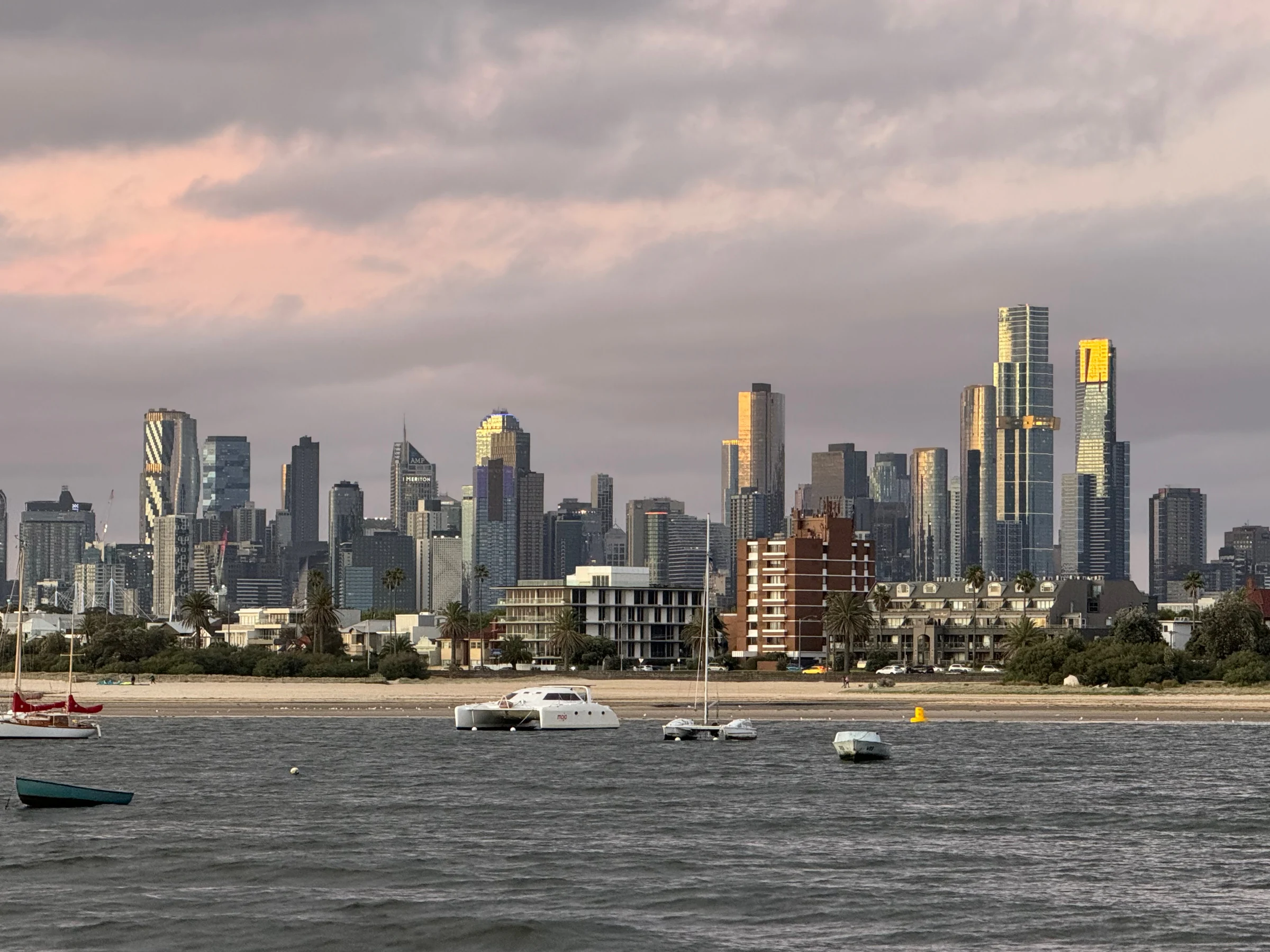 The city skyline across the water.