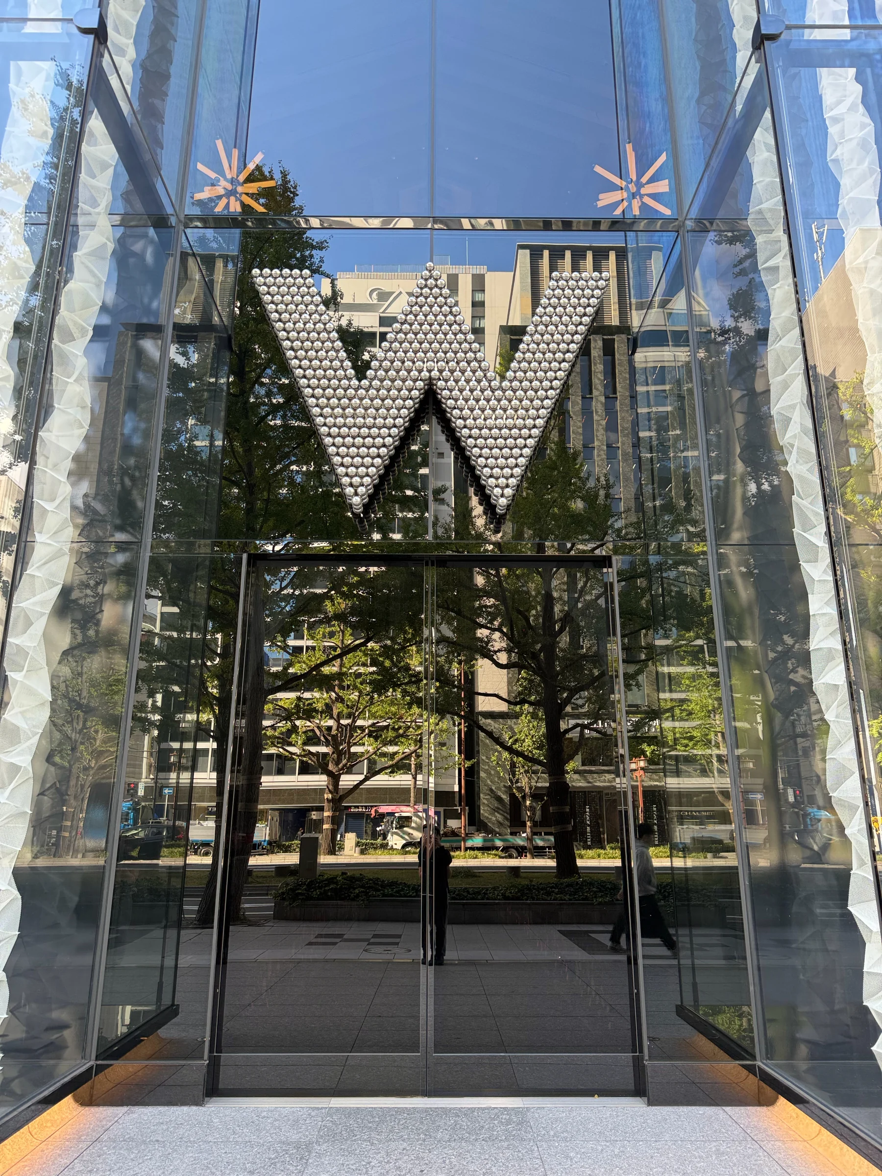 The W logo and entrance on Midosuji