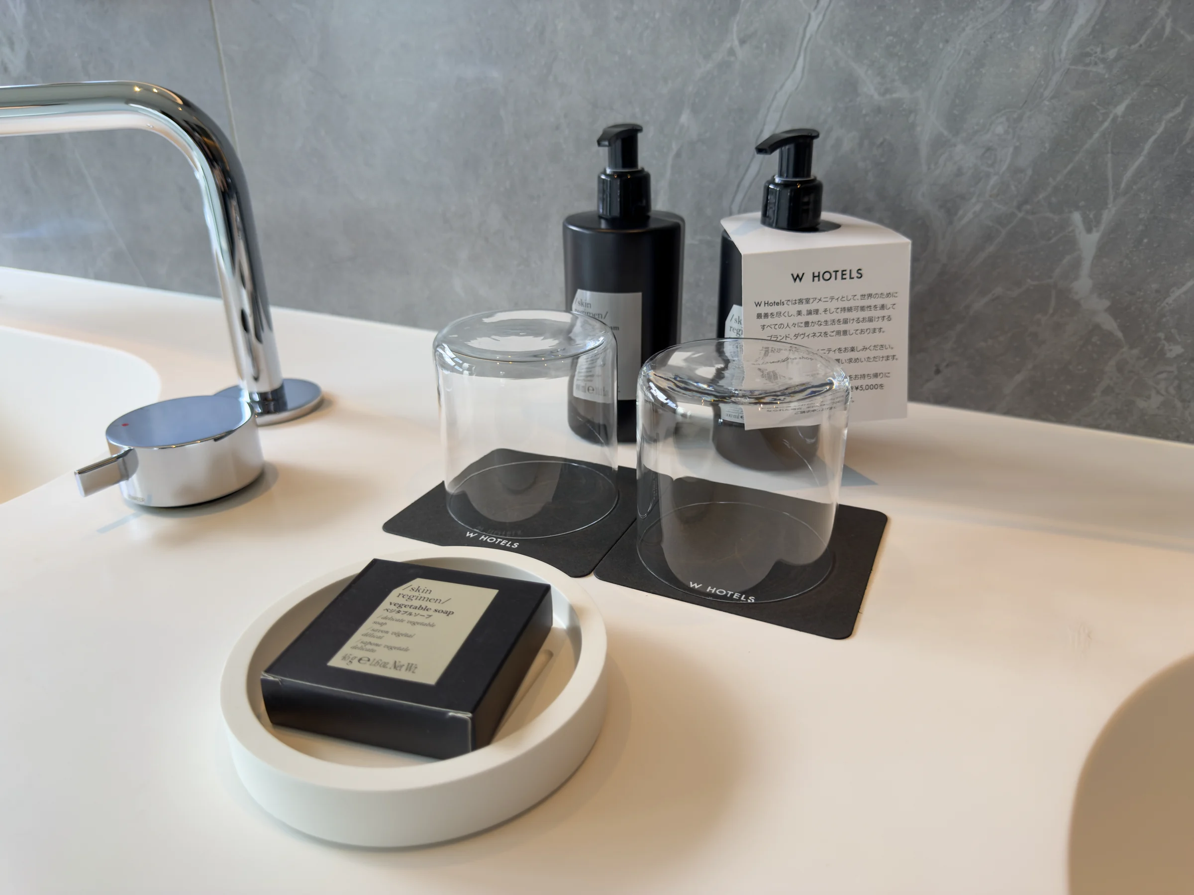 Hand wash and soap at the washbasin