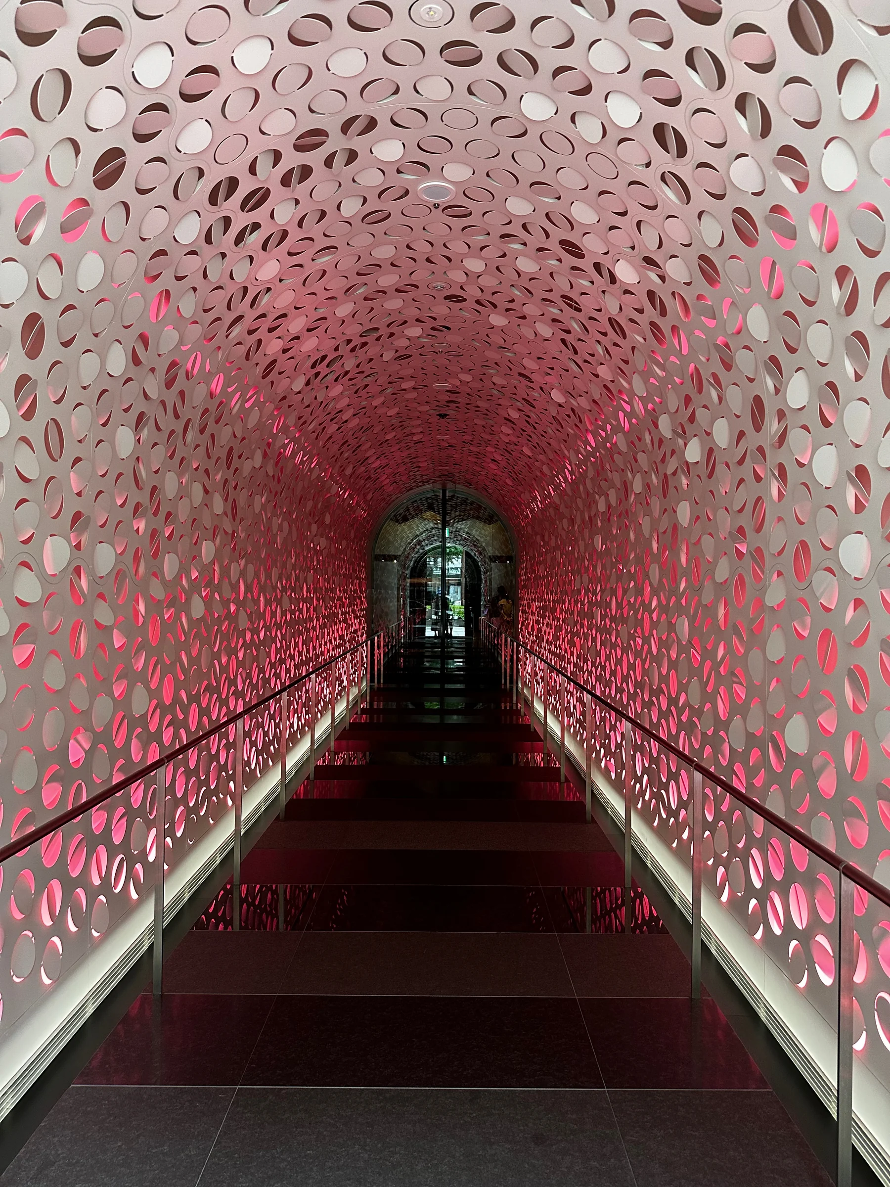 The pink-lit entrance. (May 2023)