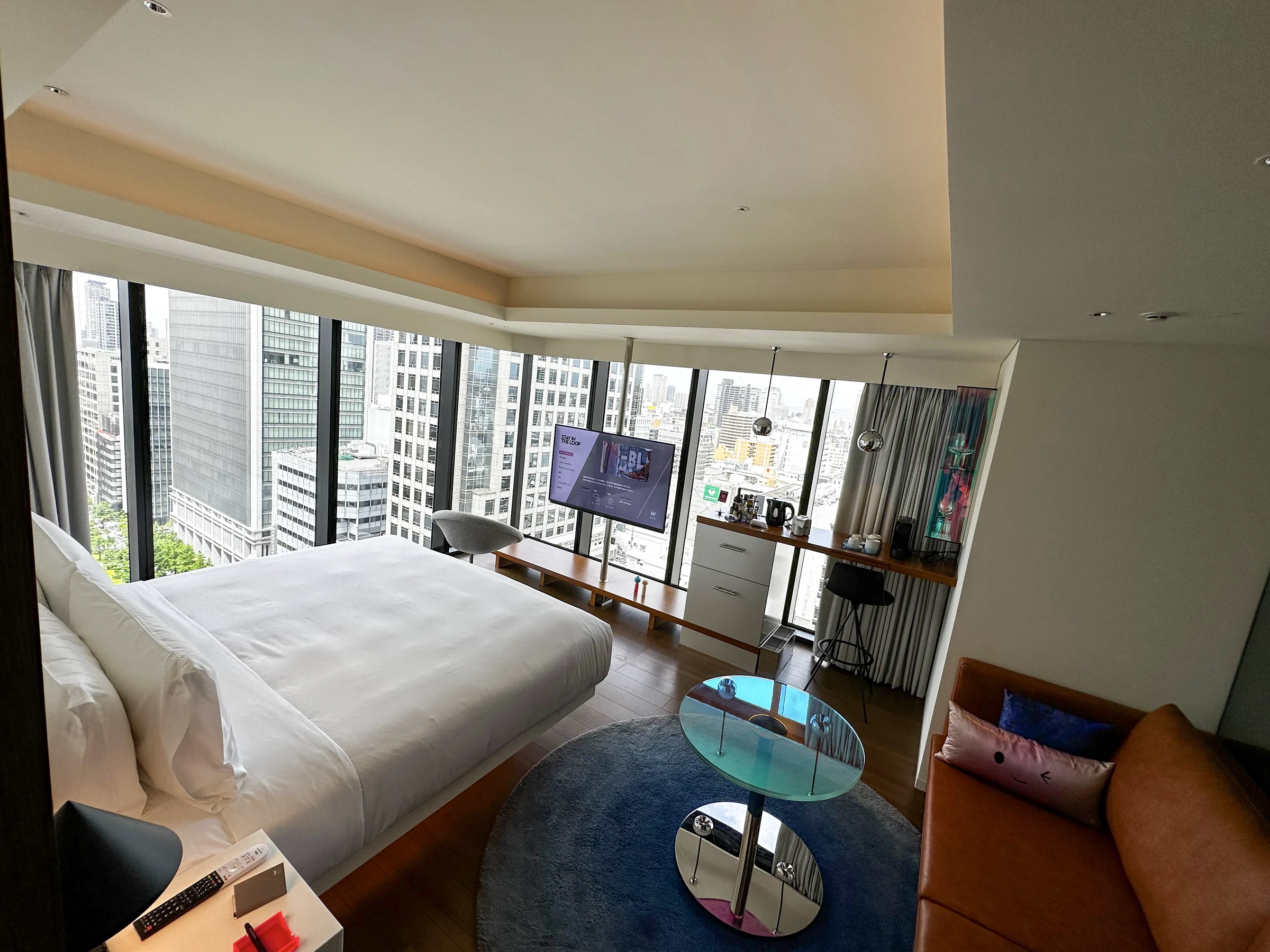 The Spectacular Room at W Osaka, with the city beyond its windows (photographed May 2023)