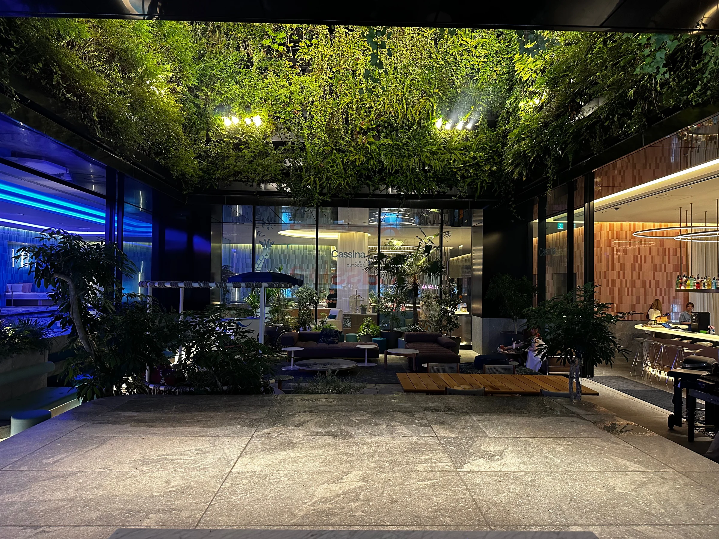 The green canopy and terrace at night. (July 2023)