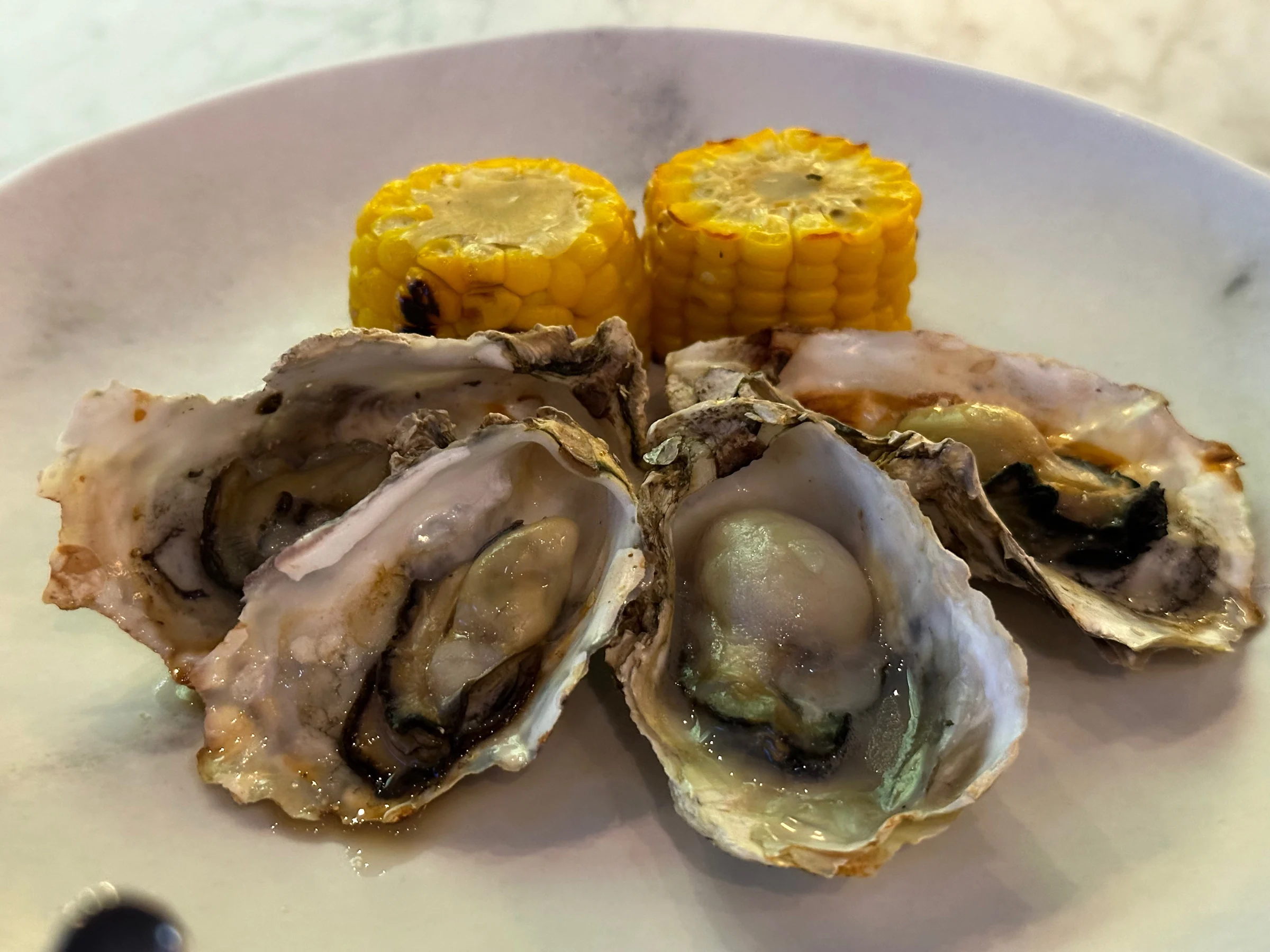 Grilled oysters and corn. (July 2023)