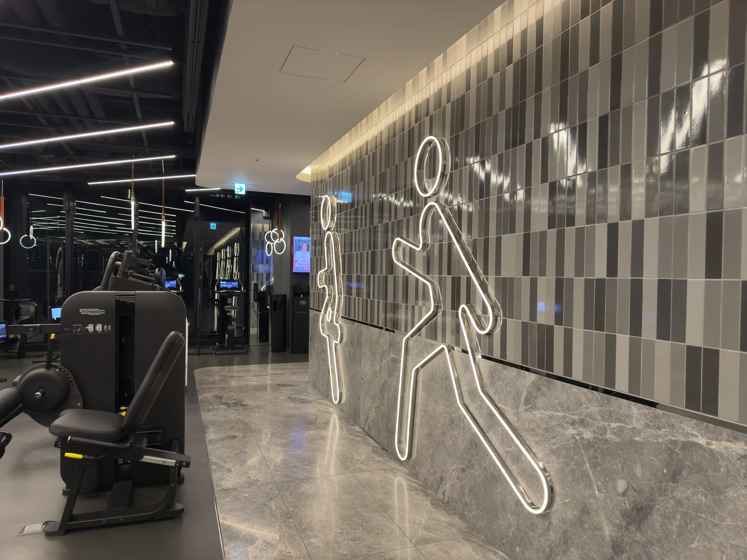 Fitness machines and neon at FIT