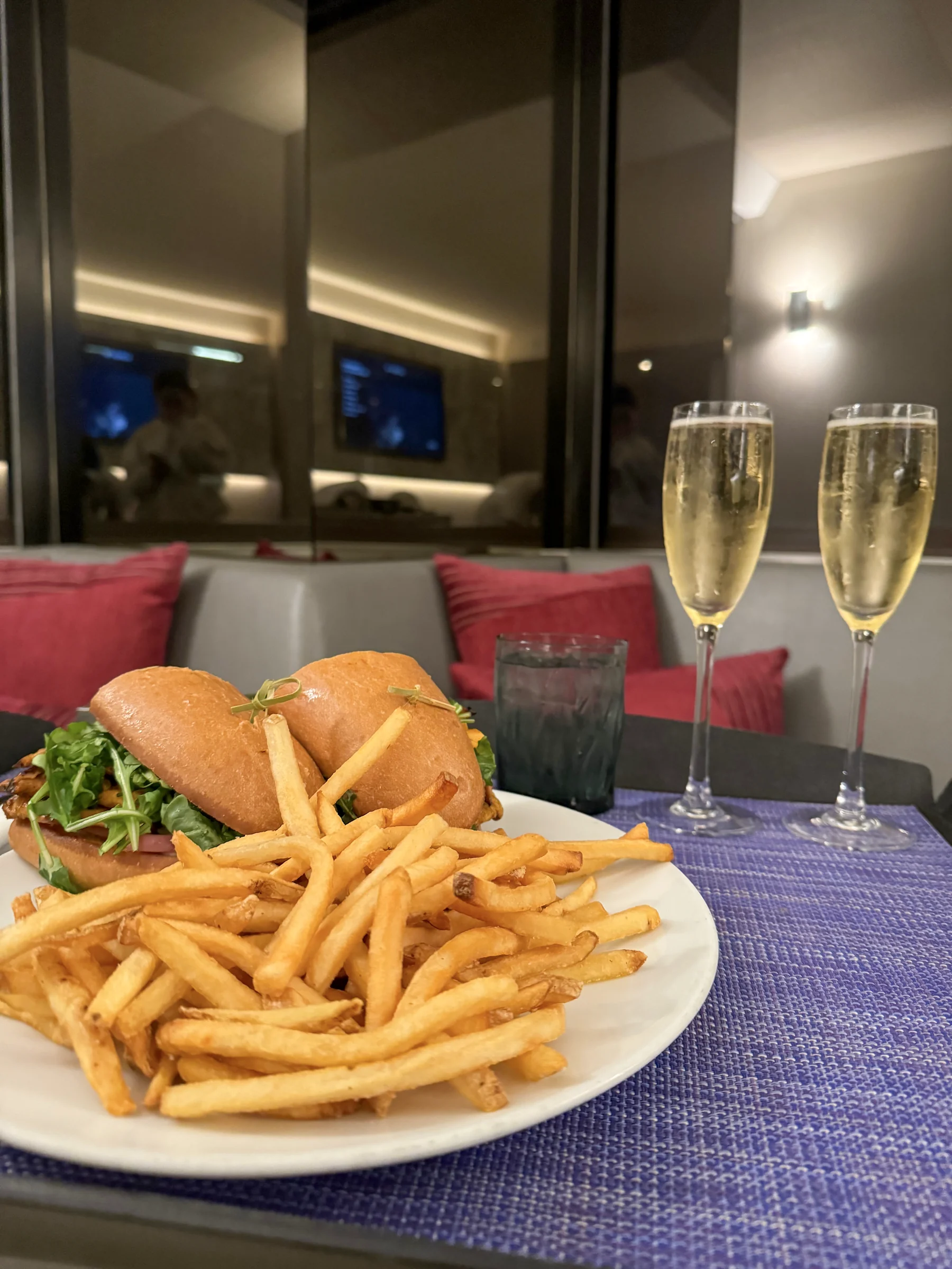 A burger and fries in the room.