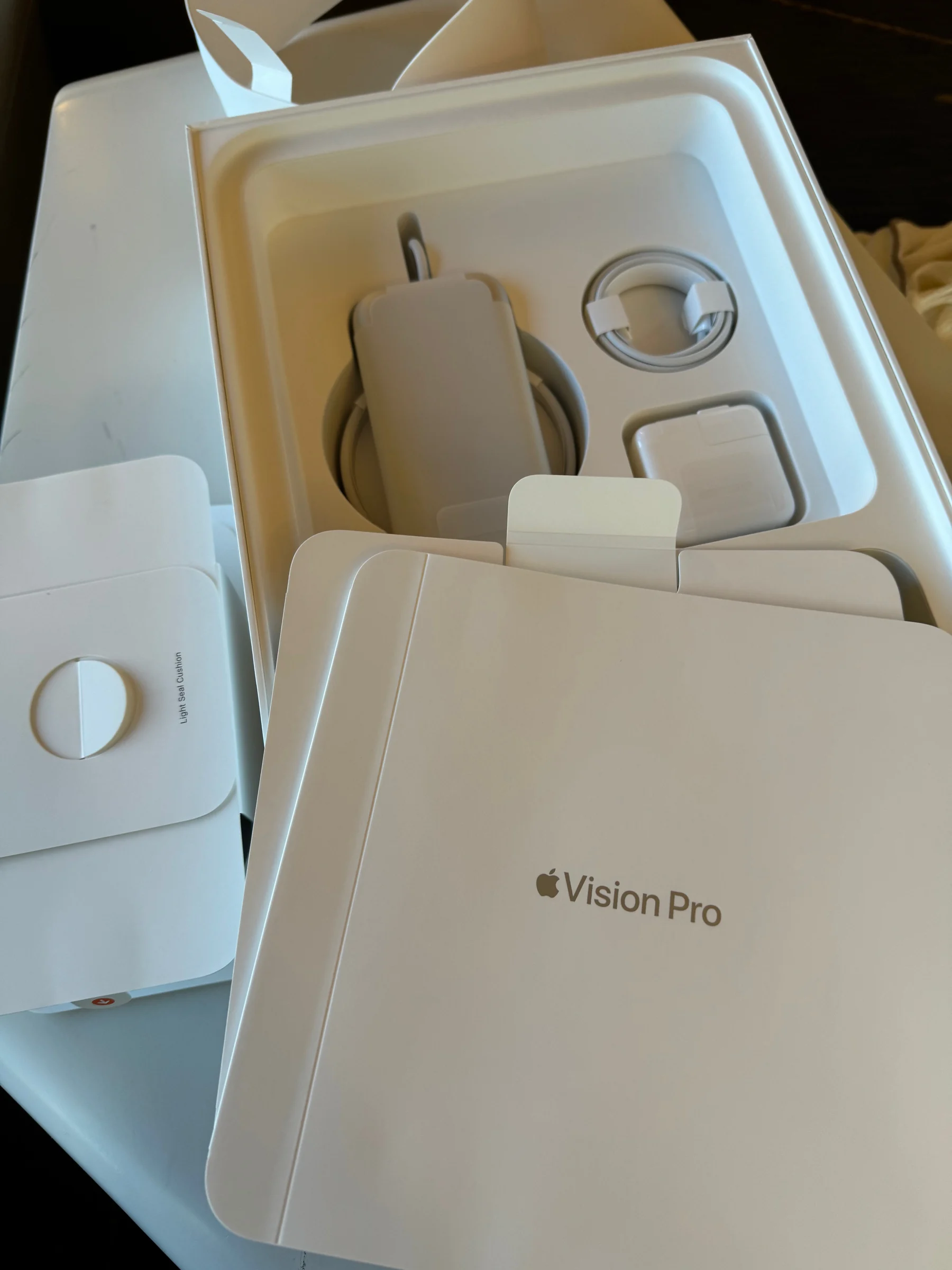 Unboxing Vision Pro in the hotel room.
