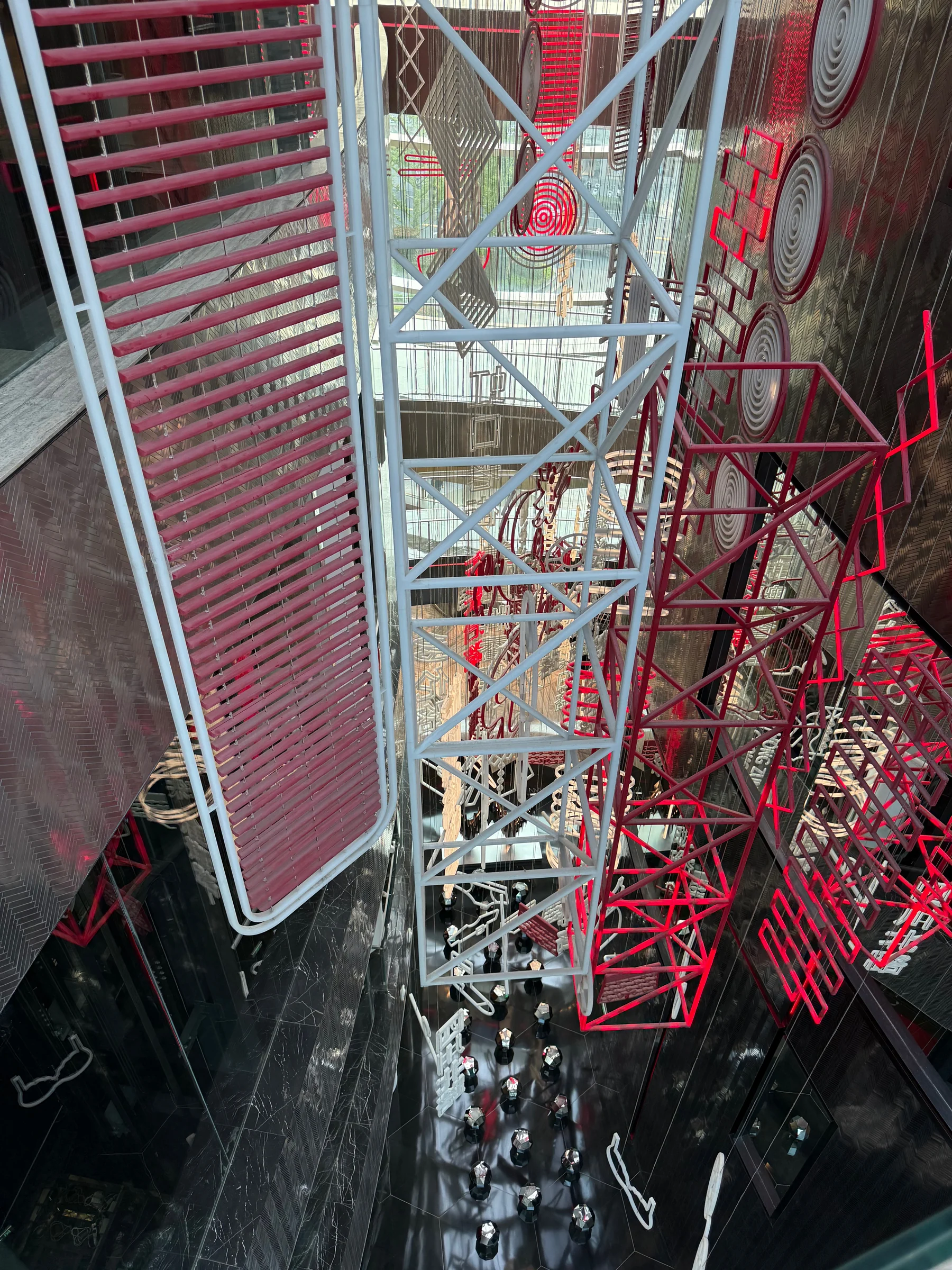 Layers of red light in the atrium.