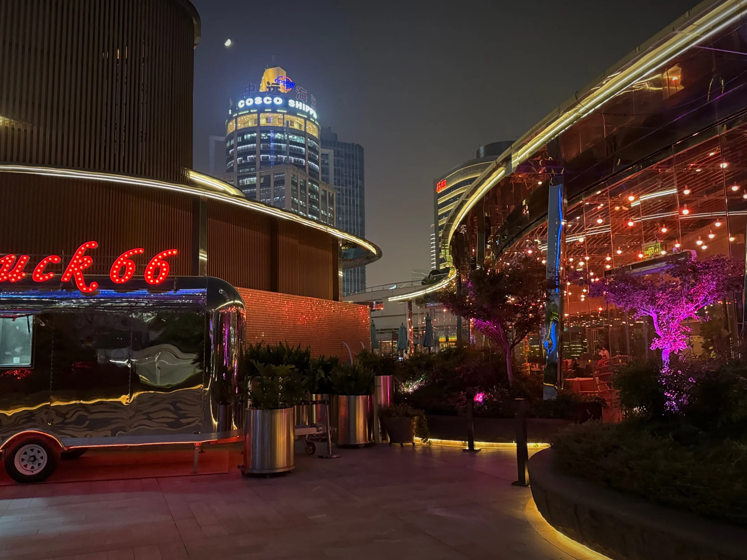 The terrace and hotel lights at night.