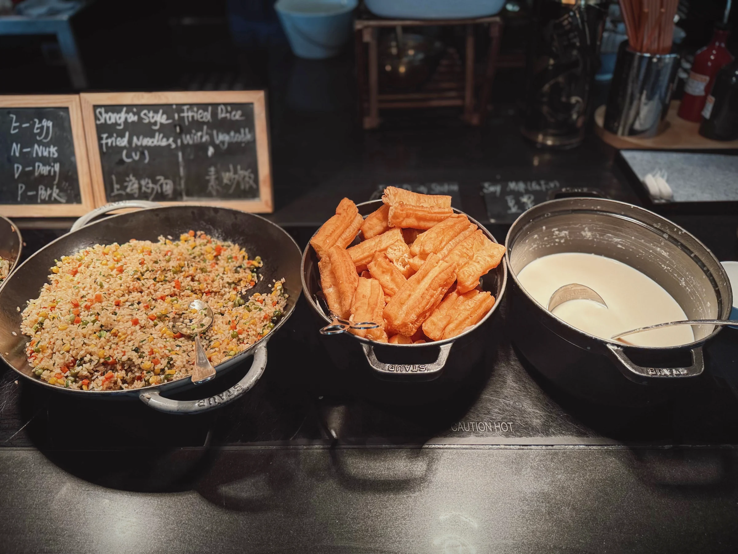Fried rice and spring rolls on the buffet.