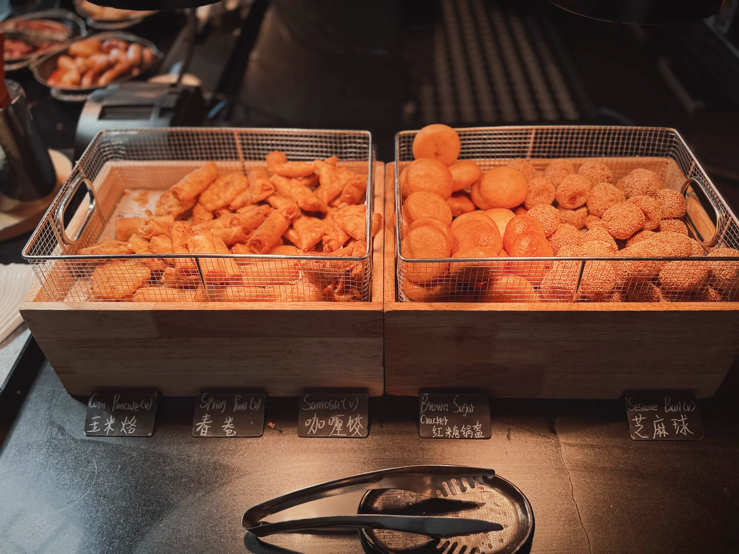 Fried Chinese treats including sesame balls.