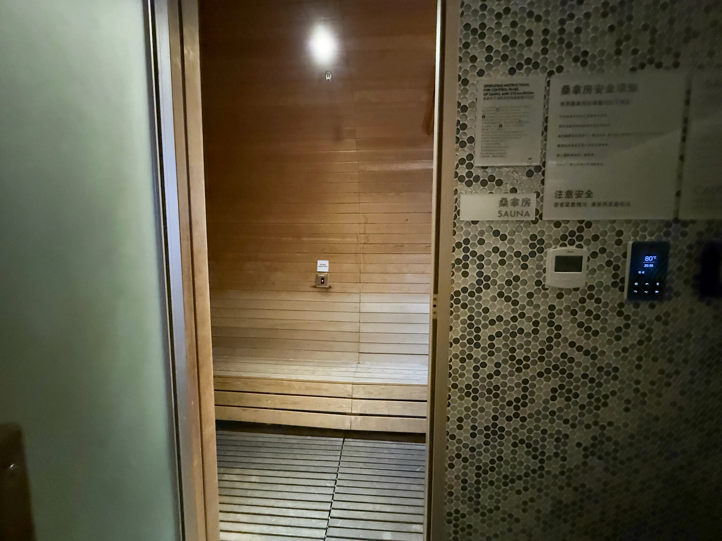 A sauna with warm wood tones.