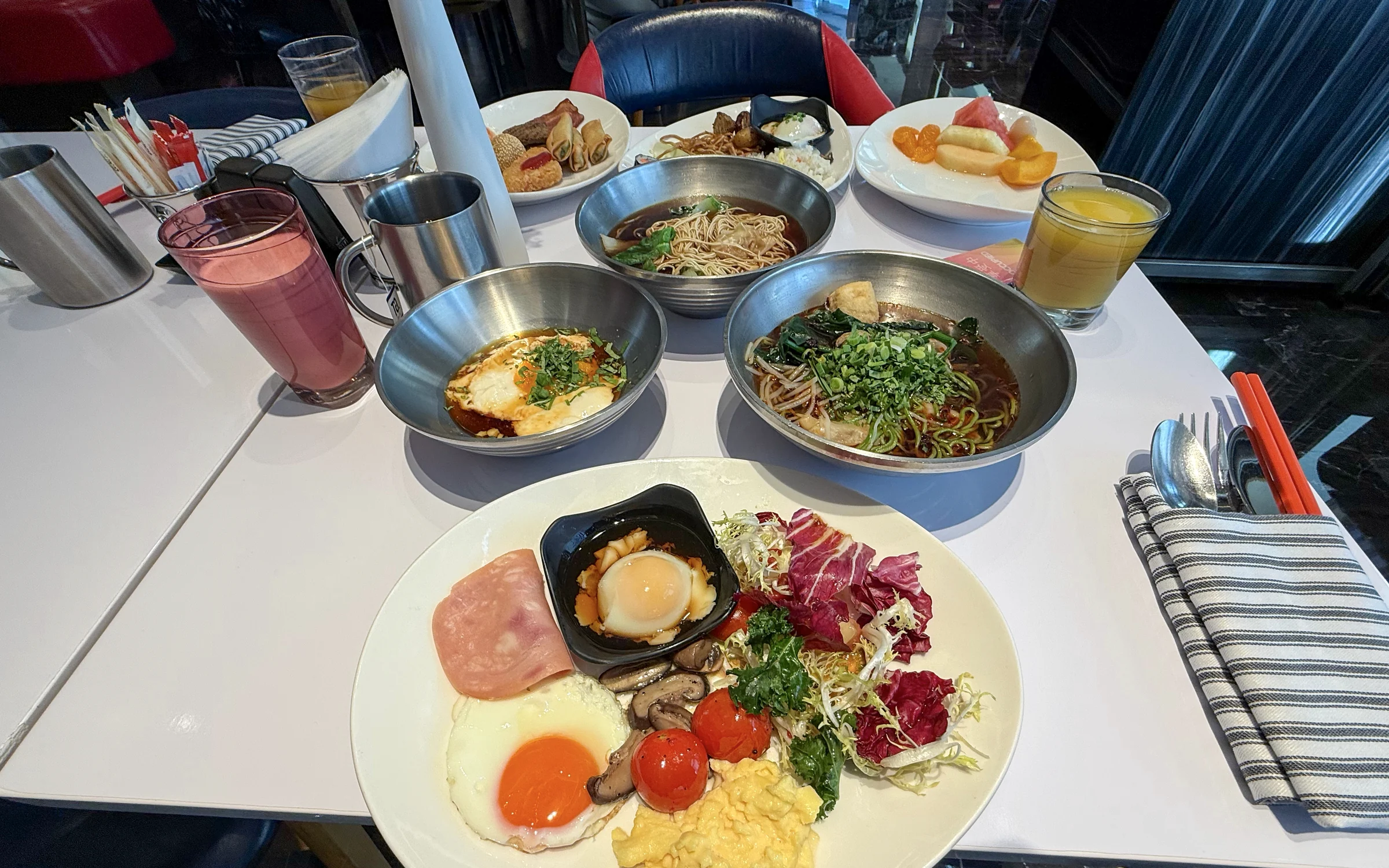 Noodles and dishes at breakfast.