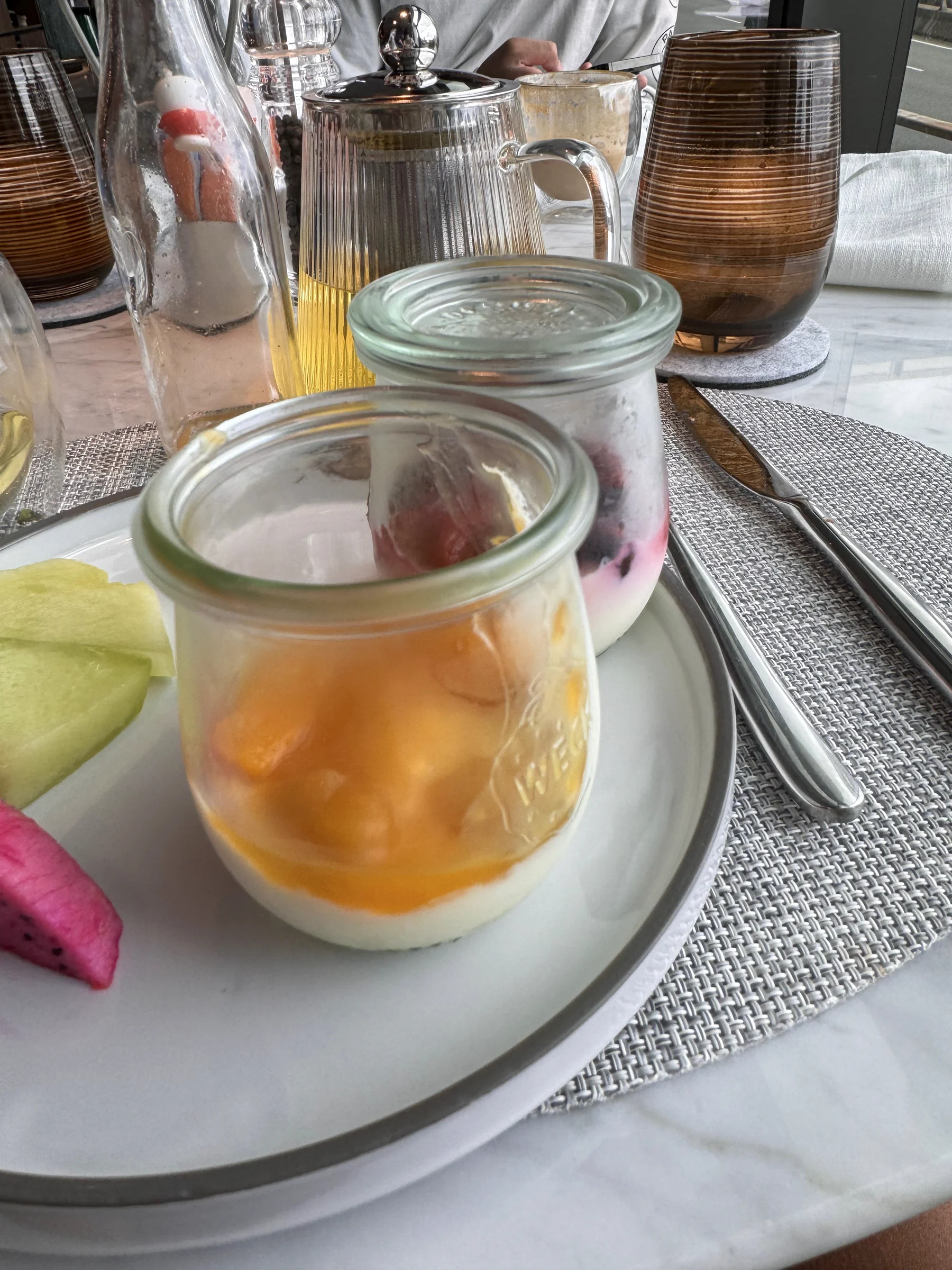 Breakfast fruit in little jars.