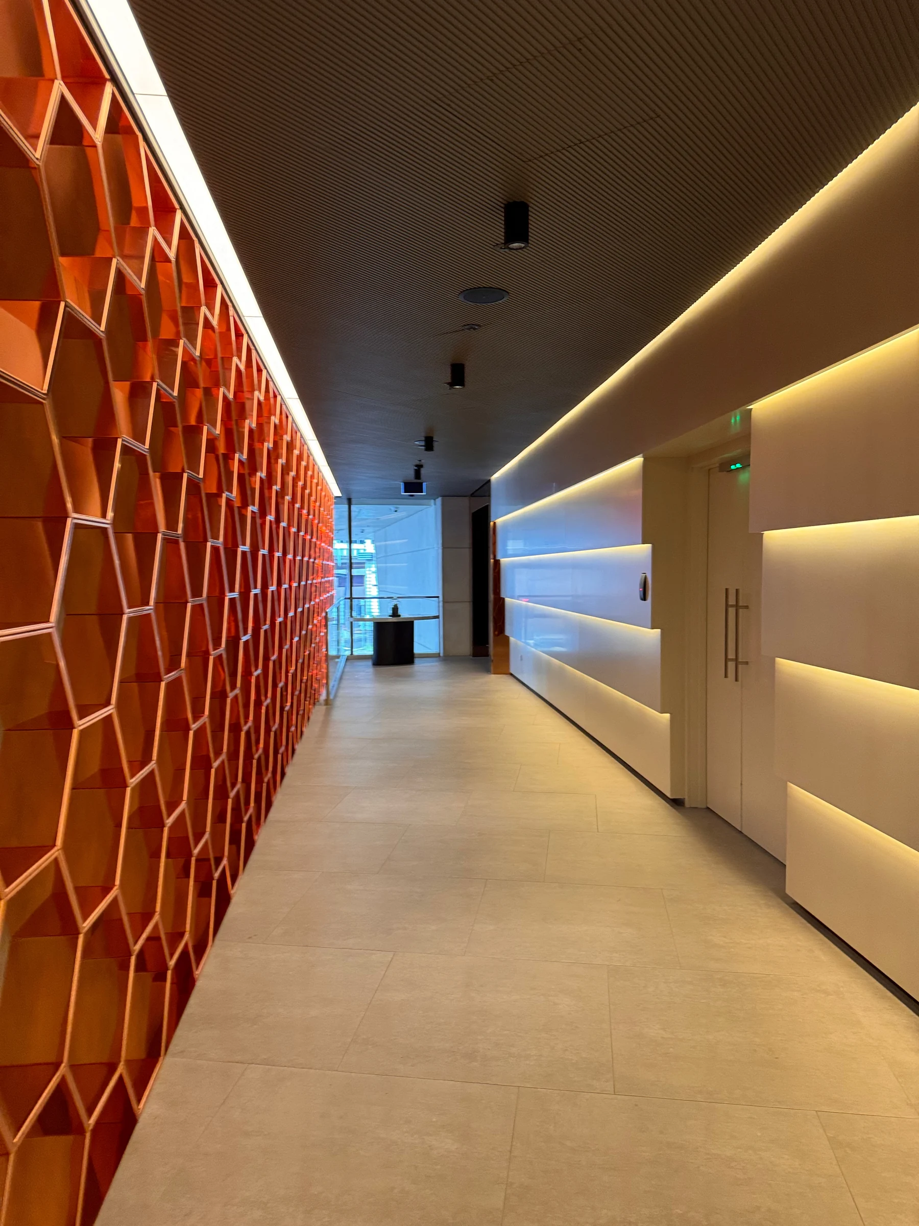 Orange curves through the hotel interior.