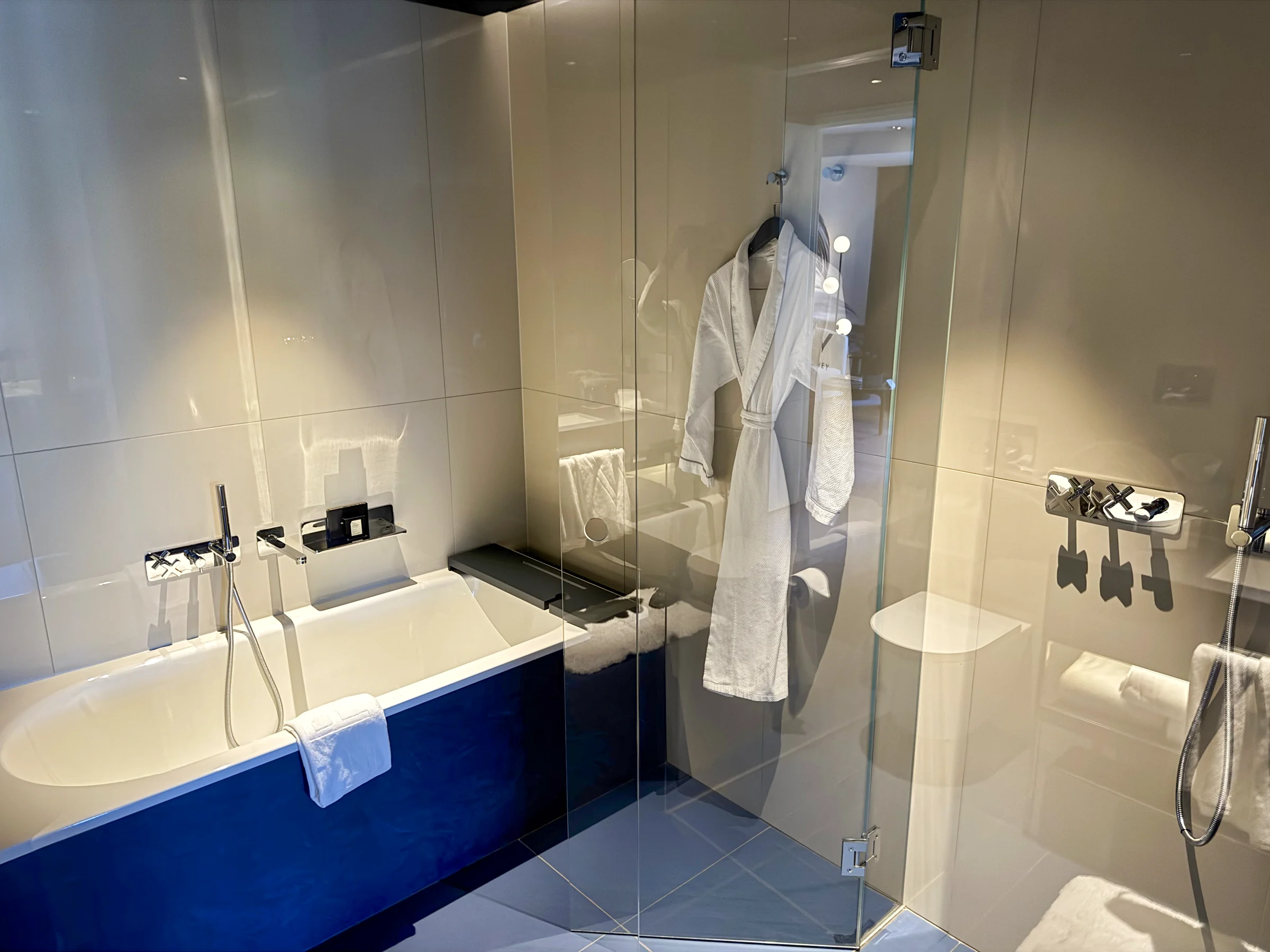 The bathtub beside the shower.