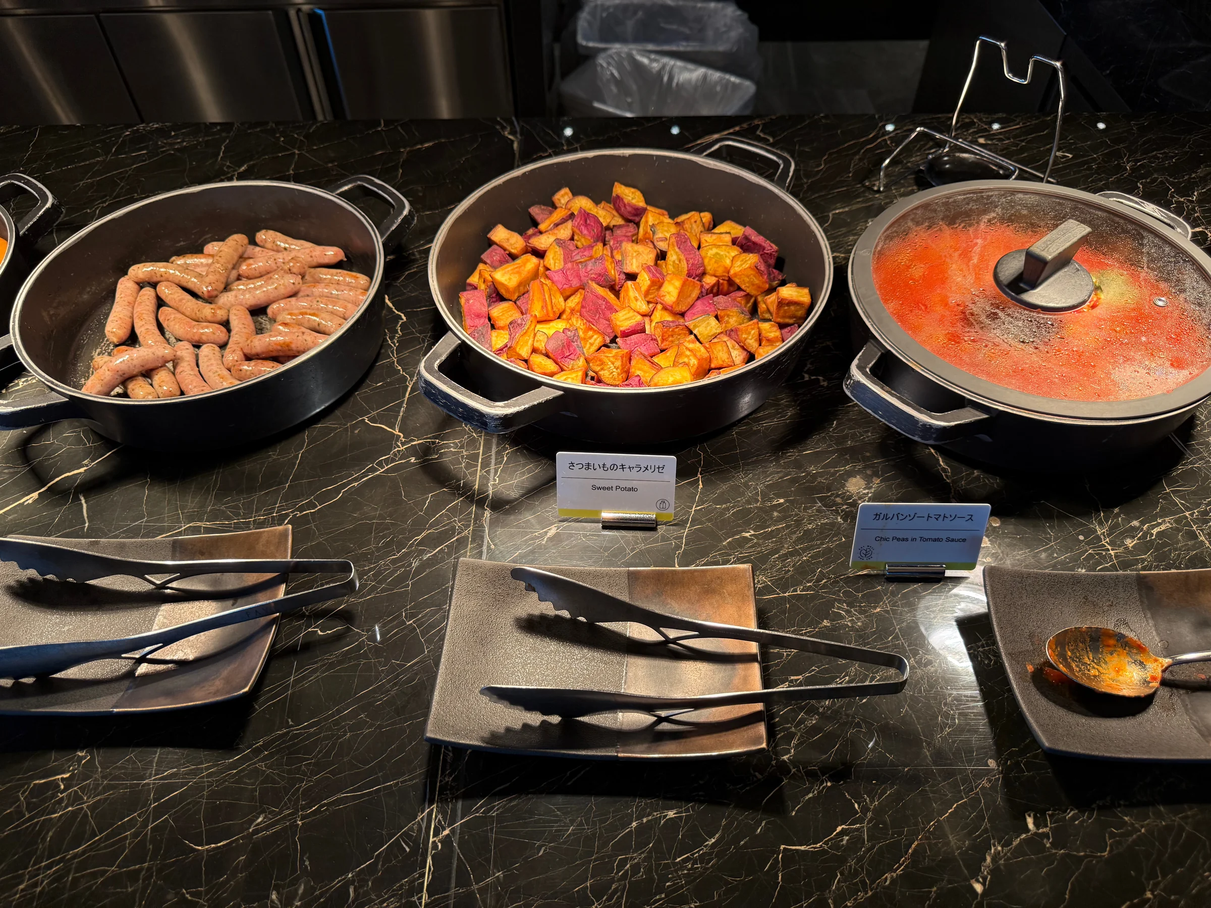 Hot breakfast dishes in small pots